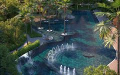 Grand central lagoon and decorative fountain feature at Ambuja Neotia Utpalaa estate.